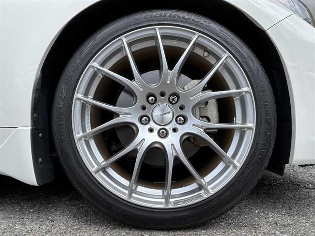 日産 スカイライン 200GT－t 埼玉県 2015(平27)年 1.9万km クリスタルホワイトパール ワンオーナー/外部検査済み/登録時走行18514km/車検R8年1月まで/OPサンルーフ/RAYS19インチアルミ/メーカー純正ナビ/フルセグTV/JESテレビキャンセラー/CD/DVD/Bluetooth/アラウンドビューモニター/クルーズコントロール/ビルトインETC/ドライブレコーダー/D/N席パワーシート/クリアランスソナー/ハーフレザー/アイドリングストップ/LEDヘッドライト/フォグランプ/オートライト/スマートキー/プッシュスタート/純正フロアマット/ドアバイザー/横滑り防止システム/電動格納ウィンカーミラー/ディーラー点検記録簿/(H28/H29/H30/H31/R2/R3/R4/R5/R6/R7)/新車保証書/取扱説明書