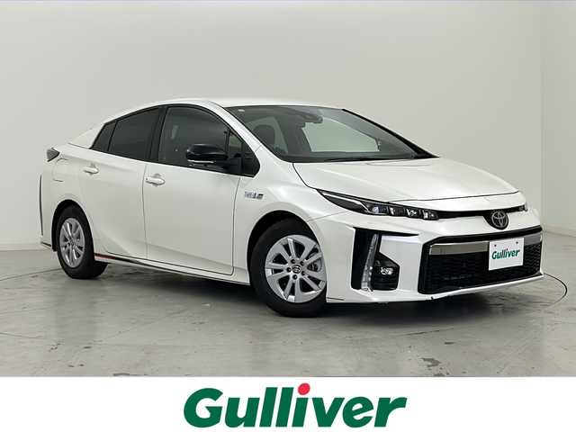 トヨタ プリウス ＰＨＶ S GRスポーツ 宮城県 2019(平31)年 7.5万km ホワイトパールクリスタルシャイン Toyota Safety Sense /・プリクラッシュセーフティ/・レーンディパーチャーアラート/・オートマチックハイビーム/・レーダークルーズコントロール/純正9インチナビ/・BT.CD.DVD.SD.USB.HDMI/・フルセグTV/バックカメラ/ハーフレザーシート/・前席シートヒーター/ビルトインETC2.0/ドライブレコーダー（FR）/LEDヘッドライト/LEDフォグライト/プッシュスタート/スマートキー×2/ステアリングスイッチ/純正フロアマット/純正15インチAW/ガナドール製マフラー/トノカバー/ウーハー/ツイーター