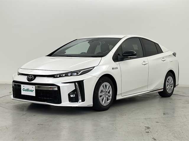 トヨタ プリウス ＰＨＶ S GRスポーツ 宮城県 2019(平31)年 7.5万km ホワイトパールクリスタルシャイン Toyota Safety Sense /・プリクラッシュセーフティ/・レーンディパーチャーアラート/・オートマチックハイビーム/・レーダークルーズコントロール/純正9インチナビ/・BT.CD.DVD.SD.USB.HDMI/・フルセグTV/バックカメラ/ハーフレザーシート/・前席シートヒーター/ビルトインETC2.0/ドライブレコーダー（FR）/LEDヘッドライト/LEDフォグライト/プッシュスタート/スマートキー×2/ステアリングスイッチ/純正フロアマット/純正15インチAW/ガナドール製マフラー/トノカバー/ウーハー/ツイーター