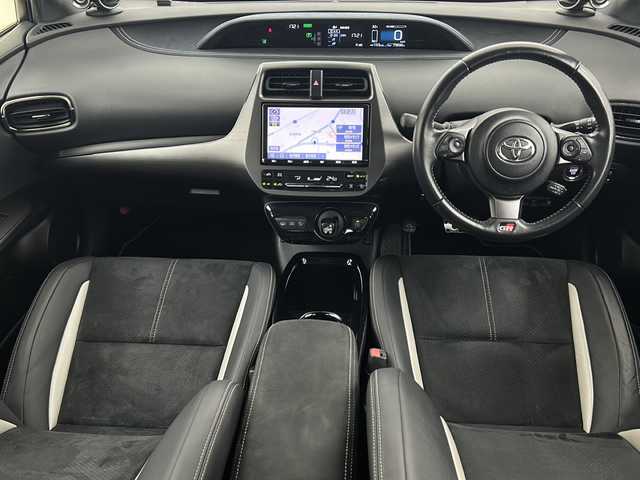 トヨタ プリウス ＰＨＶ S GRスポーツ 宮城県 2019(平31)年 7.5万km ホワイトパールクリスタルシャイン Toyota Safety Sense /・プリクラッシュセーフティ/・レーンディパーチャーアラート/・オートマチックハイビーム/・レーダークルーズコントロール/純正9インチナビ/・BT.CD.DVD.SD.USB.HDMI/・フルセグTV/バックカメラ/ハーフレザーシート/・前席シートヒーター/ビルトインETC2.0/ドライブレコーダー（FR）/LEDヘッドライト/LEDフォグライト/プッシュスタート/スマートキー×2/ステアリングスイッチ/純正フロアマット/純正15インチAW/ガナドール製マフラー/トノカバー/ウーハー/ツイーター