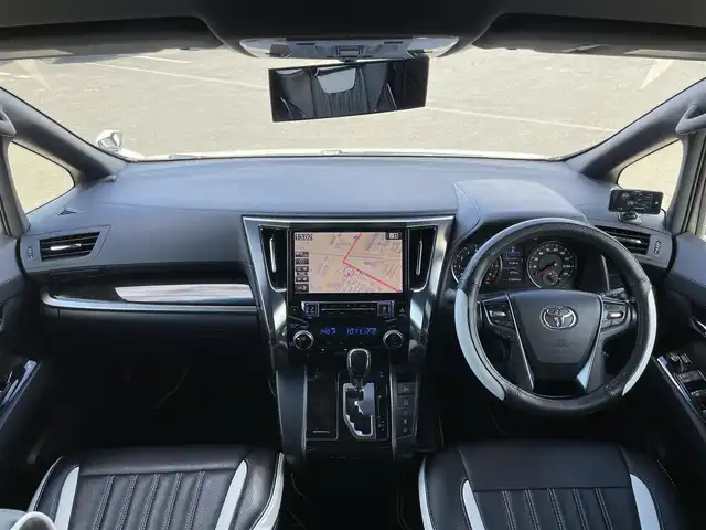 トヨタ ヴェルファイア 2.5Z Aエディデョン ゴールデンアイズ 道央・札幌 2017(平29)年 11.1万km ホワイトパールクリスタルシャイン ４WD/ワンオーナー/寒冷地仕様/社外メモリーナビ/CD/DVD/BT/フルセグ/社外フリップダウンモニター/横滑り防止装置/クルーズコントロール/クリアランスソナー/バックカメラ/ビルトインETC/アイドリングストップ/ECOMODE/ワイパーデアイサー/両側パワースライドドア/パワーバックドア/N席/２列目オットマン/レザー調シートカバー/革巻きウッドコンビステアリング/ステアリングリモコン/AC100V/電動パーキング/ブレーキホールド/レーダー探知機/MTモード付AT/プッシュスタート/スマートキー/LEDヘッドライト/オートライト/フォグランプ/電動格納ミラー/ウィンカーミラー/純正フロアマット/ドアバイザー/スペアキー/純正エンジンスターター