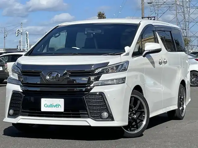 トヨタ ヴェルファイア 2.5Z Aエディデョン ゴールデンアイズ 道央・札幌 2017(平29)年 11.1万km ホワイトパールクリスタルシャイン ４WD/ワンオーナー/寒冷地仕様/社外メモリーナビ/CD/DVD/BT/フルセグ/社外フリップダウンモニター/横滑り防止装置/クルーズコントロール/クリアランスソナー/バックカメラ/ビルトインETC/アイドリングストップ/ECOMODE/ワイパーデアイサー/両側パワースライドドア/パワーバックドア/N席/２列目オットマン/レザー調シートカバー/革巻きウッドコンビステアリング/ステアリングリモコン/AC100V/電動パーキング/ブレーキホールド/レーダー探知機/MTモード付AT/プッシュスタート/スマートキー/LEDヘッドライト/オートライト/フォグランプ/電動格納ミラー/ウィンカーミラー/純正フロアマット/ドアバイザー/スペアキー/純正エンジンスターター