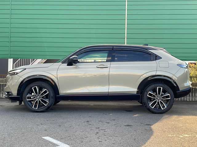 ホンダ ヴェゼル ハイブリッド e:HEV PLaY 茨城県 2021(令3)年 4.2万km サンドカーキパール パノラマルーフ/純正９インチナビ/バックカメラ/ＥＴＣ2.0/シートヒーター/ハーフレザーシート/スマートキー/プッシュスタート/ホンダセンシング/衝突被害軽減ブレーキ/レーンキープアシスト/クルーズコントロール/ブラインドスポットモニター/オートライト/オートマチックハイビーム/ステアリングヒーター/ワイアレス充電