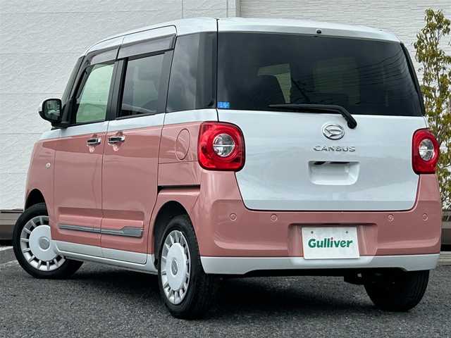ダイハツ ムーヴ キャンバス ストライプス G 千葉県 2025(令7)年 0.1万km シャイニングホワイトパール/アプリコットピンクメタリック ディスプレイオーディオ/バックカメラ/置くだけ充電/スマートアシスト/〇衝突回避支援ブレーキ機能／衝突警報機能/〇ブレーキ制御付き誤発進抑制機能（前方・後方）/〇車線逸脱抑制制御機能／車線逸脱警報機能/〇路側逸脱警報機能／ふらつき警報/〇オートハイビーム/〇標識認識機能/コーナーセンサー/両側パワースライドドア/F席シートヒーター/アイドリングストップ/電子パーキングブレーキ/オートブレーキホールド機能