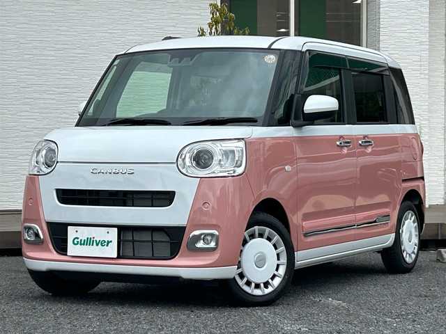ダイハツ ムーヴ キャンバス ストライプス G 千葉県 2025(令7)年 0.1万km シャイニングホワイトパール/アプリコットピンクメタリック ディスプレイオーディオ/バックカメラ/置くだけ充電/スマートアシスト/〇衝突回避支援ブレーキ機能／衝突警報機能/〇ブレーキ制御付き誤発進抑制機能（前方・後方）/〇車線逸脱抑制制御機能／車線逸脱警報機能/〇路側逸脱警報機能／ふらつき警報/〇オートハイビーム/〇標識認識機能/コーナーセンサー/両側パワースライドドア/F席シートヒーター/アイドリングストップ/電子パーキングブレーキ/オートブレーキホールド機能