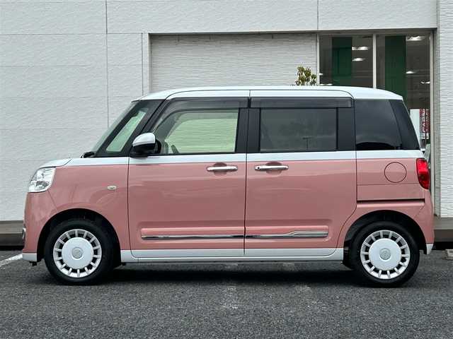 ダイハツ ムーヴ キャンバス ストライプス G 千葉県 2025(令7)年 0.1万km シャイニングホワイトパール/アプリコットピンクメタリック ディスプレイオーディオ/バックカメラ/置くだけ充電/スマートアシスト/〇衝突回避支援ブレーキ機能／衝突警報機能/〇ブレーキ制御付き誤発進抑制機能（前方・後方）/〇車線逸脱抑制制御機能／車線逸脱警報機能/〇路側逸脱警報機能／ふらつき警報/〇オートハイビーム/〇標識認識機能/コーナーセンサー/両側パワースライドドア/F席シートヒーター/アイドリングストップ/電子パーキングブレーキ/オートブレーキホールド機能