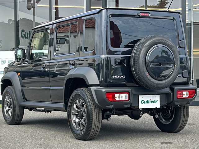 スズキ ジムニー ノマド FC 大阪府 2025(令7)年 0.1万km未満 黒 登録済未使用車/４WD/シートヒーター/背面タイヤ/５ドア/純正アルミホイール/LEDヘッドランプ/コーナーセンサー/オートライト/レーンキープアシスト/衝突被害軽減システム/保証書/取扱説明書