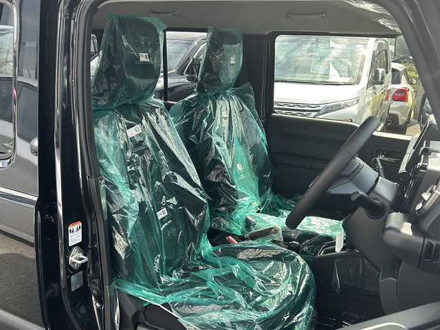 スズキ ジムニー ノマド FC 大阪府 2025(令7)年 0.1万km未満 黒 登録済未使用車/４WD/シートヒーター/背面タイヤ/５ドア/純正アルミホイール/LEDヘッドランプ/コーナーセンサー/オートライト/レーンキープアシスト/衝突被害軽減システム/保証書/取扱説明書