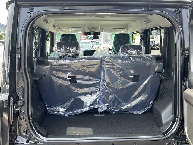 スズキ ジムニー ノマド FC 大阪府 2025(令7)年 0.1万km未満 黒 登録済未使用車/４WD/シートヒーター/背面タイヤ/５ドア/純正アルミホイール/LEDヘッドランプ/コーナーセンサー/オートライト/レーンキープアシスト/衝突被害軽減システム/保証書/取扱説明書