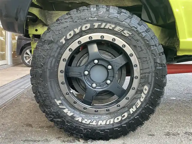 スズキ ジムニー XC 長崎県 2019(令1)年 6.8万km キネティックイエロー/ブラックトップ2トーン 衝突被害軽減ブレーキ/ディーラーOP/SDナビ【KXM-E503W】/Bluetooth接続/フルセグTV/DVD再生/クルーズコントロール/LEDオートヘッドライト/シートヒーター/ダウンヒルアシスト/リフトアップ：3インチ/社外マフラー【High-Bridge-First】/スロットルコントローラー【3-drive PRO】/社外16インチAW/ブロックタイヤ