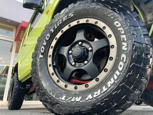 スズキ ジムニー XC 長崎県 2019(令1)年 6.8万km キネティックイエロー/ブラックトップ2トーン 衝突被害軽減ブレーキ/ディーラーOP/SDナビ【KXM-E503W】/Bluetooth接続/フルセグTV/DVD再生/クルーズコントロール/LEDオートヘッドライト/シートヒーター/ダウンヒルアシスト/リフトアップ：3インチ/社外マフラー【High-Bridge-First】/スロットルコントローラー【3-drive PRO】/社外16インチAW/ブロックタイヤ