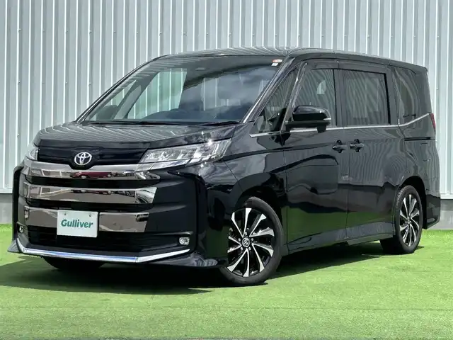 トヨタ ノア S－Z 大分県 2023(令5)年 2.3万km アティチュードブラックマイカ 純正ナビ/後席モニター/ユニバーサルステップ/バックカメラ/両側パワースライドドア/ＥＴＣ2.0/衝突軽減システム/レーンキープアシスト/クルーズコントロール/オートマチックハイビーム/シートヒーター/LEDヘッドライト/フォグランプ/革巻きステアリング/ステアリングスイッチ/純正フロアマット/ドアバイザー/スマートキー/プッシュスタート