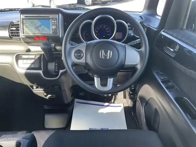 ホンダ Ｎ ＢＯＸ カスタム G Lパッケージ 長崎県 2012(平24)年 8.9万km ポリッシュドメタルメタリック (株)IDOMが運営する【じしゃロン長崎店】の自社ローン専用車両になりますこちらは現金またはオートローンご利用時の価格です。自社ローンご希望の方は別途その旨お申付け下さい/・純正ナビ（VXM-128VS）/・ワンセグTV/・バックカメラ/・片側パワースライドドア/・アイドリングストップ/・左右独立式リアセンターアームレスト/・プッシュスタート/・スマートキー/・スペアキー/・フロアマット/・ドアバイザー