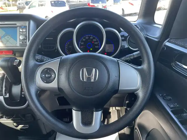 ホンダ Ｎ ＢＯＸ カスタム G Lパッケージ 長崎県 2012(平24)年 8.9万km ポリッシュドメタルメタリック (株)IDOMが運営する【じしゃロン長崎店】の自社ローン専用車両になりますこちらは現金またはオートローンご利用時の価格です。自社ローンご希望の方は別途その旨お申付け下さい/・純正ナビ（VXM-128VS）/・ワンセグTV/・バックカメラ/・片側パワースライドドア/・アイドリングストップ/・左右独立式リアセンターアームレスト/・プッシュスタート/・スマートキー/・スペアキー/・フロアマット/・ドアバイザー