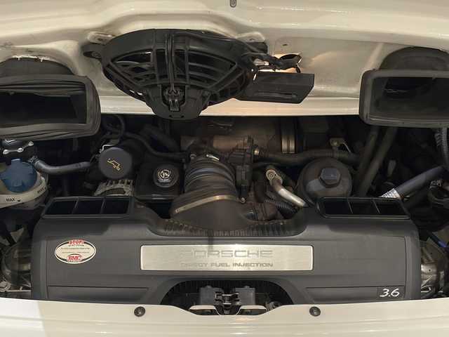 ポルシェ ９１１ カレラ4 新潟県 2009(平21)年 3.7万km カレラホワイト スポーツクロノパッケージ/イエローキャリパー/GT3RS仕様バンパー等/RECAROシート(ブラックレザー/アルカンターラ(D席)/黒革シート/シートヒーター/社外メモリナビ/(CD/DVD/Bluetooth/フルセグTV)/バックカメラ/ETC/ドライブレコーダー/パドルシフト/リモコンキー/保証書/取扱説明書