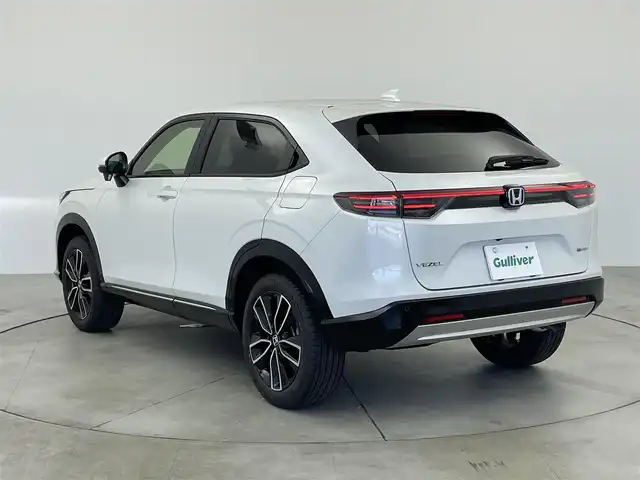 ホンダ ヴェゼル ハイブリッド e:HEV Z 愛知県 2025(令7)年 0.1千km プラチナホワイトパール 登録済み未使用車/ワイヤレス充電/純正9インチナビ/Apple CarPlay/Android Auto/Bluetooth/バックカメラ　/フルセグTV/ホンダセンシング/衝突被害軽減システム/クルーズコントロール/横滑り防止装置/コーナーセンサー/レーンキープアシスト/ブラインドスポットモニター/オートライト/オートマチックハイビーム/LEDヘッドライト/LEDフォグランプ/電動リアゲート/シートヒーター/ステアリングヒーター/パドルシフト/フルフラットシート/チップアップシート/ETC2.0/純正AW/スマートキー/スペアキー