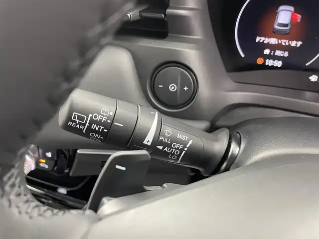 ホンダ ヴェゼル ハイブリッド e:HEV Z 愛知県 2025(令7)年 0.1千km プラチナホワイトパール 登録済み未使用車/ワイヤレス充電/純正9インチナビ/Apple CarPlay/Android Auto/Bluetooth/バックカメラ　/フルセグTV/ホンダセンシング/衝突被害軽減システム/クルーズコントロール/横滑り防止装置/コーナーセンサー/レーンキープアシスト/ブラインドスポットモニター/オートライト/オートマチックハイビーム/LEDヘッドライト/LEDフォグランプ/電動リアゲート/シートヒーター/ステアリングヒーター/パドルシフト/フルフラットシート/チップアップシート/ETC2.0/純正AW/スマートキー/スペアキー
