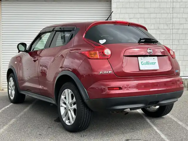 日産 ジューク 15RX Vセレ ドレスアップ 新潟県 2011(平23)年 7万km ラディアントレッド 社外ナビ【フルセグTV/FM・AM/CD/BT】/オートライト/電格ミラー/純正アルミホイール/純正フロアマット/盗難防止/横滑り防止/革巻きステアリング/プッシュスタート/スマートキー