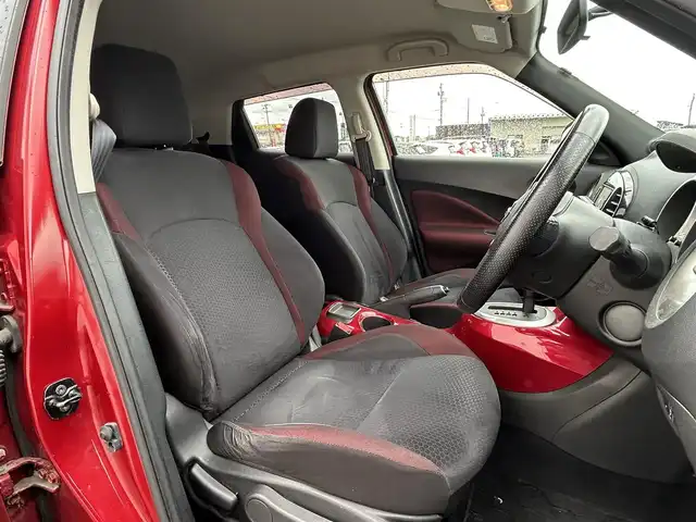 日産 ジューク 15RX Vセレ ドレスアップ 新潟県 2011(平23)年 7万km ラディアントレッド 社外ナビ【フルセグTV/FM・AM/CD/BT】/オートライト/電格ミラー/純正アルミホイール/純正フロアマット/盗難防止/横滑り防止/革巻きステアリング/プッシュスタート/スマートキー