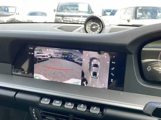 ポルシェ ポルシェ ９１１ カレラ 東京都 2024(令6)年 0.6万km グレー 車体色　M7J　スレートグレーネオ/ワンオーナー/スポーツクロノ/新車時保証書　/取扱説明書/ブレーキアシスト/レーンキープアシスト/レーンチェンジアシスト/アダプティブクルーズコントロール/純正ナビ/BT/USB/AppleCarplay/360度カメラ　ETC【2.0】/ドライブレコーダー【３６０度＋前後】/レザーシート/シートヒーター/フロント背もたれパワーシート/スポーツエキゾーストシステム/アクティブサスペンション/スマートキー×２/LEDヘッドライト/オートライト/パドルシフト付皮巻きハンドル/Carrera　S　20インチアルミ【フロント】/Carrera　S　21インチアルミ【リヤ】
