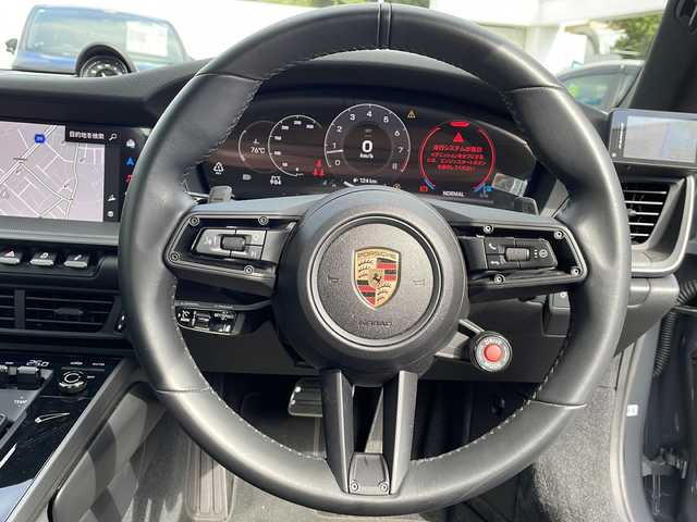 ポルシェ ポルシェ ９１１ カレラ 東京都 2024(令6)年 0.6万km グレー 車体色　M7J　スレートグレーネオ/ワンオーナー/スポーツクロノ/新車時保証書　/取扱説明書/ブレーキアシスト/レーンキープアシスト/レーンチェンジアシスト/アダプティブクルーズコントロール/純正ナビ/BT/USB/AppleCarplay/360度カメラ　ETC【2.0】/ドライブレコーダー【３６０度＋前後】/レザーシート/シートヒーター/フロント背もたれパワーシート/スポーツエキゾーストシステム/アクティブサスペンション/スマートキー×２/LEDヘッドライト/オートライト/パドルシフト付皮巻きハンドル/Carrera　S　20インチアルミ【フロント】/Carrera　S　21インチアルミ【リヤ】