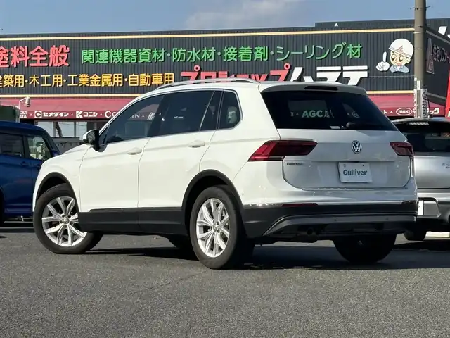 フォルクスワーゲン ティグアン TSI ハイライン 愛知県 2019(平31)年 1.5万km ピュアホワイト /正規ディーラー車/禁煙/黒革シート//純正ナビ/フルセグ/CD/DVD/SD/BT/USB/AUX//全方位カメラ/前後ドラレコ/ビルトインETC2.0//シートヒーター/メモリ付きパワーシート//革巻きステア/ステアスイッチ/パドルシフト//電動パ＾キングブレーキ//ACC/フロントアシスト/レーンキープアシスト/サイドアシスト//アテンションアラート/ダイナミックライトアシスト/パークアシスト//プロアクティブオキュパントプロテクション/パークアシスト//純正LEDオートライト/純正フォグ//純正ゴムマット/純正18インチAW/ルーフレール//パワーバックドア/照明付きバニティミラー//新車時保証書//取扱説明書//スペアスマートキー
