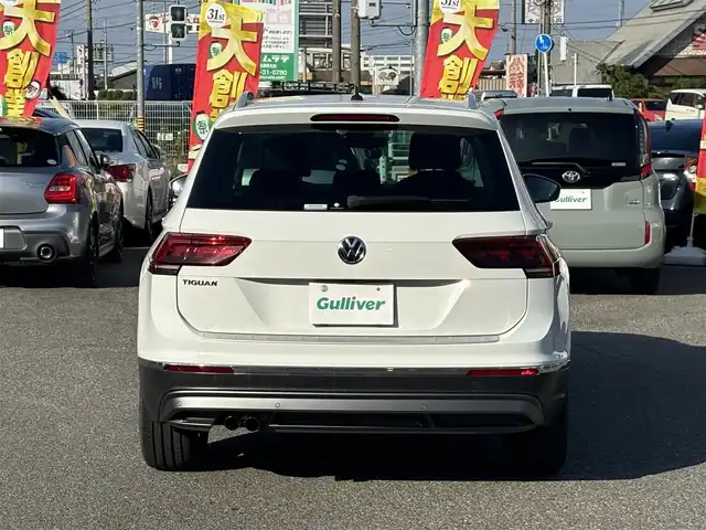 フォルクスワーゲン ティグアン TSI ハイライン 愛知県 2019(平31)年 1.5万km ピュアホワイト /正規ディーラー車/禁煙/黒革シート//純正ナビ/フルセグ/CD/DVD/SD/BT/USB/AUX//全方位カメラ/前後ドラレコ/ビルトインETC2.0//シートヒーター/メモリ付きパワーシート//革巻きステア/ステアスイッチ/パドルシフト//電動パ＾キングブレーキ//ACC/フロントアシスト/レーンキープアシスト/サイドアシスト//アテンションアラート/ダイナミックライトアシスト/パークアシスト//プロアクティブオキュパントプロテクション/パークアシスト//純正LEDオートライト/純正フォグ//純正ゴムマット/純正18インチAW/ルーフレール//パワーバックドア/照明付きバニティミラー//新車時保証書//取扱説明書//スペアスマートキー