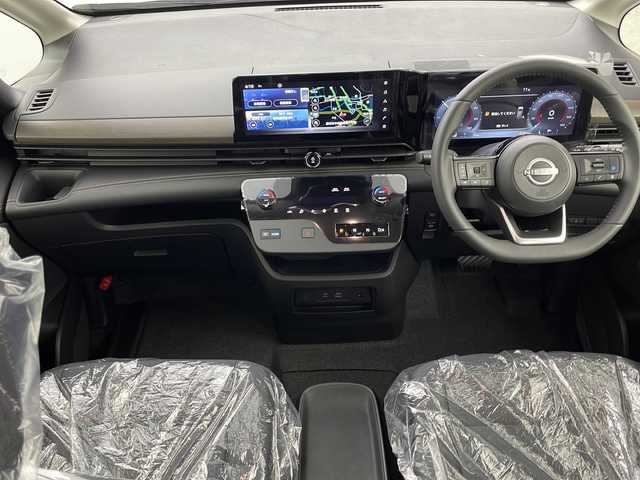 日産 セレナ e－パワー ハイウェイスター V 熊本県 2025(令7)年 0.1千km プリズムホワイト 純正12.3型ナビ（ＴＶフルセグ，ＢＴ）/純正後席モニター　/アラウンドビューモニター　/エマージェンシーブレーキ　/車線逸脱警報　/コーナーセンサー　/プロパイロット　/両側電動パワースライドドア/インテリジェントルームミラー　/ビルトインETC2.0　/純正アルミホイール１６インチ　/純正LEDヘッドライト/オートライト/HDMI　/USB/スマートキー/スペアキー