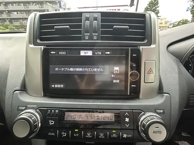 トヨタ ランドクルーザー プラド TX Lパッケージ 東京都 2012(平24)年 15.1万km ブラック ・純正ナビ/（NHZD-W62G)/（CD/DVD/フルセグ/Bluetooth/MSV)/・バックカメラ/・革シート/・前席パワーシート/・前席シートヒーター/・電動格納ウィンカーミラー/・革ステアリング/・フロントドライブレコーダー/・クルーズコントロール/・ETC/・フロントフォグランプ/・ライトレベライザー/・プライバシーガラス/・ISOFIX/・フロアマット/・バイザー/・ルーフレール/・冬タイヤAW付き4本積込/・純正17インチアルミホイール/・スマートキー/・プッシュスタート/・スペアキー×1/・W+サイド+カーテンSRS&ABS/・横滑り防止装置/・取扱説明書