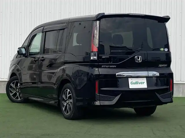 ホンダ ステップワゴン スパーダ ホンダセンシング 香川県 2019(平31)年 0.9万km プレミアムスパークルブラックパール 登録時走行距離：8922km/メーカー純正10型ナビ/　CD DVD BT フルセグTV/バックカメラ/純正11.6型フリップダウンモニター/両側パワースライドドア/衝突被害軽減装置/レーンキープアシスト/レーダークルーズコントロール/横滑り防止装置/アイドリングストップ/LEDヘッドライト/オートライト/フォグランプ/ロールサンシェード/革巻きステアリング/ステアリングスイッチ/パドルシフト/プッシュスタート/スマートキー/スペアキー
