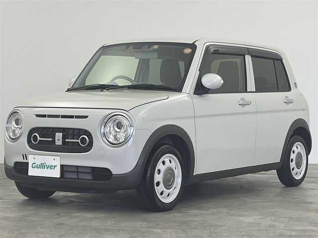 スズキ ラパン ＬＣ X 群馬県 2023(令5)年 1.3万km ソフトベージュメタリック 衝突被害軽減ブレーキ　社外７インチディスプレイオーディオ　バックカメラ　ＬＥＤライト　ハーフレザーシート　シートヒーター　純正１４インチＡＷ　ステアリングリモコン　スマートキー　プッシュスタート　禁煙