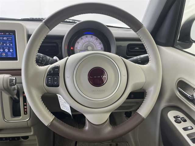スズキ ラパン ＬＣ X 群馬県 2023(令5)年 1.3万km ソフトベージュメタリック 衝突被害軽減ブレーキ　社外７インチディスプレイオーディオ　バックカメラ　ＬＥＤライト　ハーフレザーシート　シートヒーター　純正１４インチＡＷ　ステアリングリモコン　スマートキー　プッシュスタート　禁煙