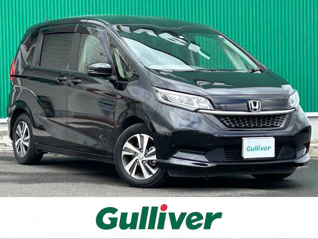 ホンダ フリード G 宮城県 2023(令5)年 5.3万km クリスタルブラックパール Sパッケージ/・LEDヘッドランプ＋アクティブコーナリングランプ/・15インチアルミホイール/・革巻きステアリング/・SRSエアバッグ（サイド/カーテン）/・ブラックウォールナット木目調インパネ加飾/・ブラックプライムスムース（合皮）/ダイヤ柄ファブリックコンビシート/・シートバックアッパーポケット（運転席/助手席）/＝＝＝/ホンダセンシング/・衝突軽減ブレーキ/・歩行者事故低減ステアリング/・アダプティブクルーズコントロール/・車線維持支援システム/・路外逸脱抑制機能/・誤発進抑制機能（前方/後方）/・先行車発進お知らせ機能/・標識認識機能/・マルチインフォメーションディスプレイ/純正ナビ（VXM-234VFi）/・CD/DVD/・Bluetooth/・フルセグTV/バックカメラ/ビルトインETC/ドライブレコーダー/コンフォートビューパッケージ/両側パワースライドドア/シートヒーター/革巻きステアリング/ステアリングスイッチ/オートライト/スマートキー＆プッシュスタート/電動格納ミラー/フロアマット/ドアバイザー