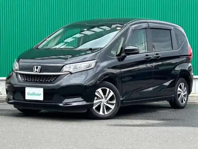 ホンダ フリード G 宮城県 2023(令5)年 5.3万km クリスタルブラックパール Sパッケージ/・LEDヘッドランプ＋アクティブコーナリングランプ/・15インチアルミホイール/・革巻きステアリング/・SRSエアバッグ（サイド/カーテン）/・ブラックウォールナット木目調インパネ加飾/・ブラックプライムスムース（合皮）/ダイヤ柄ファブリックコンビシート/・シートバックアッパーポケット（運転席/助手席）/＝＝＝/ホンダセンシング/・衝突軽減ブレーキ/・歩行者事故低減ステアリング/・アダプティブクルーズコントロール/・車線維持支援システム/・路外逸脱抑制機能/・誤発進抑制機能（前方/後方）/・先行車発進お知らせ機能/・標識認識機能/・マルチインフォメーションディスプレイ/純正ナビ（VXM-234VFi）/・CD/DVD/・Bluetooth/・フルセグTV/バックカメラ/ビルトインETC/ドライブレコーダー/コンフォートビューパッケージ/両側パワースライドドア/シートヒーター/革巻きステアリング/ステアリングスイッチ/オートライト/スマートキー＆プッシュスタート/電動格納ミラー/フロアマット/ドアバイザー