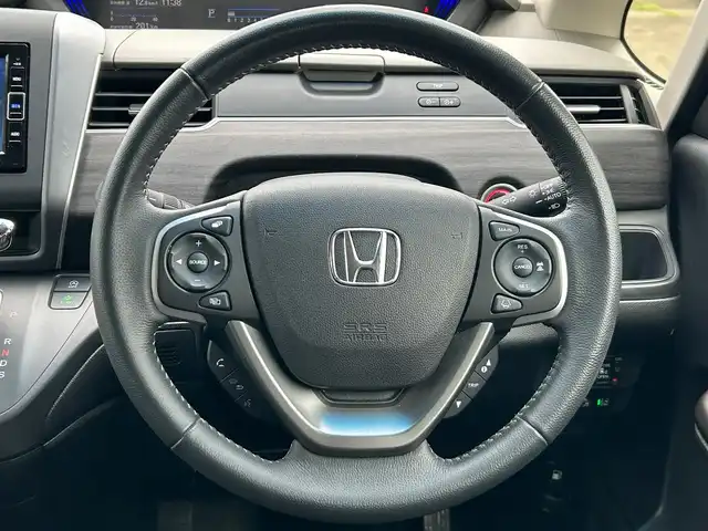 ホンダ フリード G 宮城県 2023(令5)年 5.3万km クリスタルブラックパール Sパッケージ/・LEDヘッドランプ＋アクティブコーナリングランプ/・15インチアルミホイール/・革巻きステアリング/・SRSエアバッグ（サイド/カーテン）/・ブラックウォールナット木目調インパネ加飾/・ブラックプライムスムース（合皮）/ダイヤ柄ファブリックコンビシート/・シートバックアッパーポケット（運転席/助手席）/＝＝＝/ホンダセンシング/・衝突軽減ブレーキ/・歩行者事故低減ステアリング/・アダプティブクルーズコントロール/・車線維持支援システム/・路外逸脱抑制機能/・誤発進抑制機能（前方/後方）/・先行車発進お知らせ機能/・標識認識機能/・マルチインフォメーションディスプレイ/純正ナビ（VXM-234VFi）/・CD/DVD/・Bluetooth/・フルセグTV/バックカメラ/ビルトインETC/ドライブレコーダー/コンフォートビューパッケージ/両側パワースライドドア/シートヒーター/革巻きステアリング/ステアリングスイッチ/オートライト/スマートキー＆プッシュスタート/電動格納ミラー/フロアマット/ドアバイザー