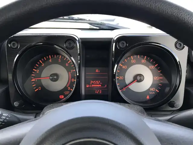 スズキ ジムニー XG 鳥取県 2020(令2)年 3.5万km スペリアホワイト ワンオーナー/４・W・D/ターボ車/5速MT/横滑り防止装置/ヒルディセントコントロール/トランスファーレバー/純正16インチアルミホイール/背面タイヤ/サイドアンダーミラー付きドアミラー/フォグライト/スペアキー