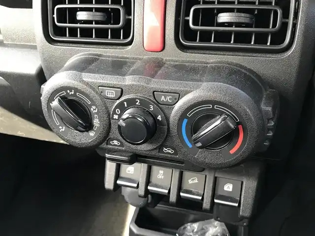 スズキ ジムニー XG 鳥取県 2020(令2)年 3.5万km スペリアホワイト ワンオーナー/４・W・D/ターボ車/5速MT/横滑り防止装置/ヒルディセントコントロール/トランスファーレバー/純正16インチアルミホイール/背面タイヤ/サイドアンダーミラー付きドアミラー/フォグライト/スペアキー