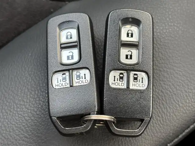 ホンダ Ｎ ＢＯＸ カスタム L ターボ 滋賀県 2021(令3)年 4.9万km プラチナホワイトパール 社外８型ナビ/・Bluetooth/フルセグ/・CD/DVD/バックカメラ/革巻きステアリング/ステアリングリモコン/パドルシフト/USB充電/ETC/前席シートヒーター/LEDオートライト/フォグライト/両側パワースライドドア/シートリフター/オートリトラミラー/ホンダセンシング/・衝突軽減ブレーキシステム/・アダプティブクルーズコントロール/・先行車発進お知らせ/・路外逸脱抑制機能/スマートキー