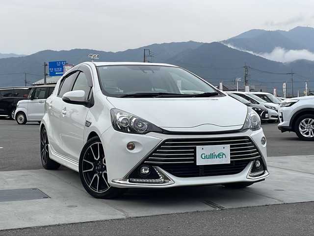 トヨタ アクア G G’s 山梨県 2016(平28)年 4.5万km ライムホワイトパールクリスタルシャイン フルセグテレビ/バックカメラ/クルーズコントロール/ETC/プッシュスタート/衝突軽減装置/Bluetooth再生/オートエアコン/オートライト/レーンキープアシスト/Ｇ＇ｓ専用１７インチアルミホイール/LEDヘッドライト/純正ナビ/ハーフレザーシート