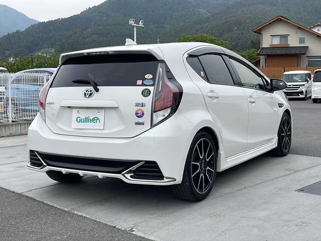 トヨタ アクア G G’s 山梨県 2016(平28)年 4.5万km ライムホワイトパールクリスタルシャイン フルセグテレビ/バックカメラ/クルーズコントロール/ETC/プッシュスタート/衝突軽減装置/Bluetooth再生/オートエアコン/オートライト/レーンキープアシスト/Ｇ＇ｓ専用１７インチアルミホイール/LEDヘッドライト/純正ナビ/ハーフレザーシート