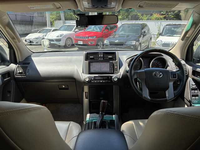 トヨタ ランドクルーザー プラド TX 熊本県 2010(平22)年 7.8万km ホワイトパールクリスタルシャイン 4WD/純正HDDナビ（NHZN-W60G)/【フルセグTV/CD/DVD/Bluetooth】/バックカメラ/革調シートカバー/ドライブレコーダー/オートライト/カーテンエアバック/横滑り防止装置/純正フロアマット/保証書/取扱説明書