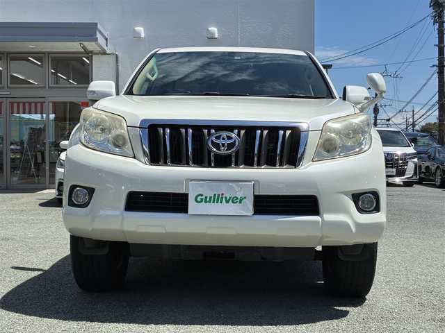 トヨタ ランドクルーザー プラド TX 熊本県 2010(平22)年 7.8万km ホワイトパールクリスタルシャイン 4WD/純正HDDナビ（NHZN-W60G)/【フルセグTV/CD/DVD/Bluetooth】/バックカメラ/革調シートカバー/ドライブレコーダー/オートライト/カーテンエアバック/横滑り防止装置/純正フロアマット/保証書/取扱説明書