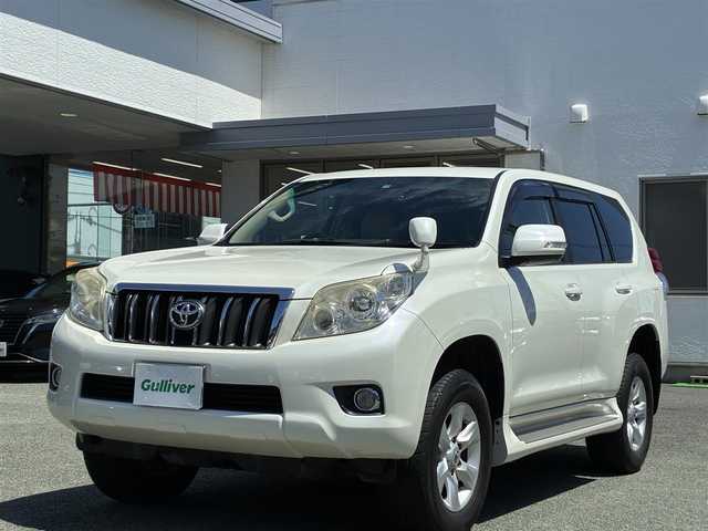 トヨタ ランドクルーザー プラド TX 熊本県 2010(平22)年 7.8万km ホワイトパールクリスタルシャイン 4WD/純正HDDナビ（NHZN-W60G)/【フルセグTV/CD/DVD/Bluetooth】/バックカメラ/革調シートカバー/ドライブレコーダー/オートライト/カーテンエアバック/横滑り防止装置/純正フロアマット/保証書/取扱説明書