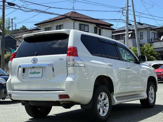 トヨタ ランドクルーザー プラド TX 熊本県 2010(平22)年 7.8万km ホワイトパールクリスタルシャイン 4WD/純正HDDナビ（NHZN-W60G)/【フルセグTV/CD/DVD/Bluetooth】/バックカメラ/革調シートカバー/ドライブレコーダー/オートライト/カーテンエアバック/横滑り防止装置/純正フロアマット/保証書/取扱説明書