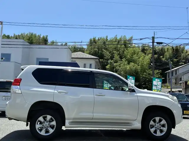 トヨタ ランドクルーザー プラド TX 熊本県 2010(平22)年 7.8万km ホワイトパールクリスタルシャイン 4WD/純正HDDナビ（NHZN-W60G)/【フルセグTV/CD/DVD/Bluetooth】/バックカメラ/革調シートカバー/ドライブレコーダー/オートライト/カーテンエアバック/横滑り防止装置/純正フロアマット/保証書/取扱説明書