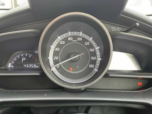 マツダ デミオ 13S 山形県 2015(平27)年 4.4万km アルミニウムメタリック ・ワンオーナー/・純正ナビ/Bluetooth/AUX/・バックカメラ/・ETC/・MTモード付きAT/・クルーズコントロール（社外品）/・衝突被害軽減システム/・横滑り防止装置/・LEDヘッドランプ/・オートライト/・純正マット/・スタットレスタイヤ車載/・保証書/・取扱説明書