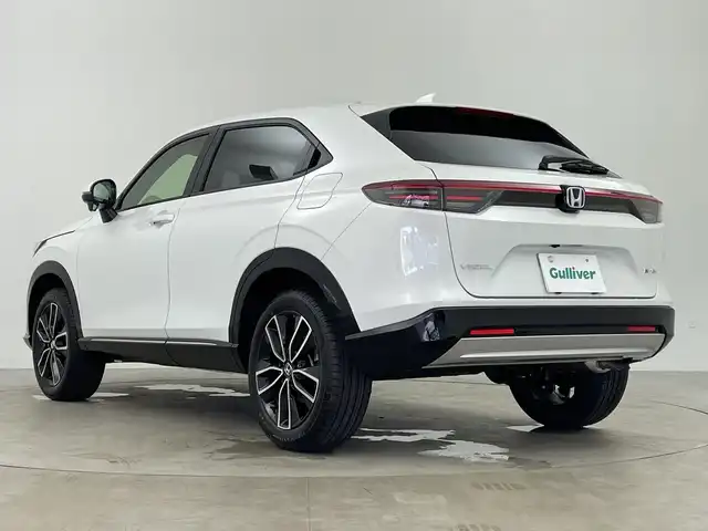 ホンダ ヴェゼル ハイブリッド e:HEV Z 鹿児島県 2025(令7)年 0.1千km パール 登録済未使用車/HondaSENSING/・衝突軽減ブレーキ/・誤発信抑制機能/・車線維持支援システム/・先行車発進お知らせ機能/・路外逸脱抑制機能/・トラフィックジャムアシスト/・渋滞追従機能付きアダプティブクルーズコントロール/・ブラインドスポットインフォメーション/純正ディスプレイオーディオ/(BT/Applecarplay/Androidauto/AM/FM/フルセグTV)/パドルシフト/純正ビルトインETC2.0/チップアップシート/ハーフレザーシート/前席シートヒーター/パワーバックドア/純正18インチアルミホイール/前後コーナーセンサー/オートマチックハイビーム/純正LEDヘッドライト