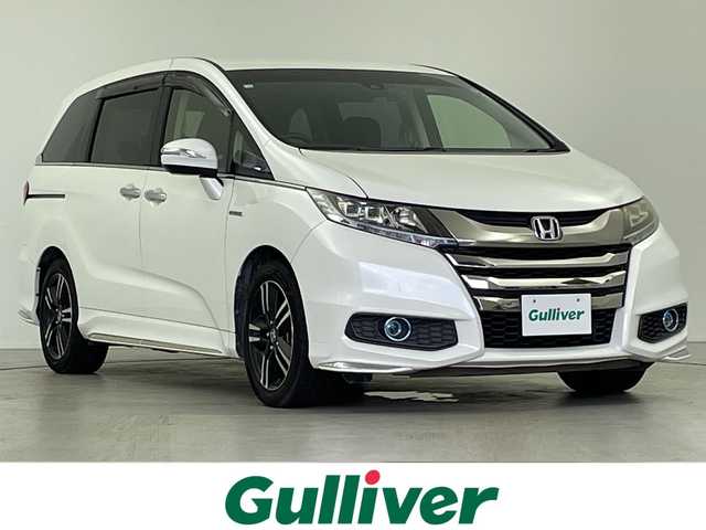 ホンダ オデッセイ ハイブリッド アブソルートセンシングEXパック 岐阜県 2016(平28)年 5.2万km ホワイトオーキッドパール 純正フリップダウンモニター/純正SDナビ/CD/DVD/SD/フルセグ/バックカメラ/ドライブレコーダー/ETC/ホンダセンシング/・衝突軽減ブレーキ/・車線維持支援システム/・アダプティブクルーズコントロール/ブラインドスポットモニター/両側パワースライドドア/オットマン/革巻きステアリング/ステアリングリモコン/LEDオートライト/純正フロアマット/ドアバイザー/プッシュスタート/純正17インチAW/スマートキー