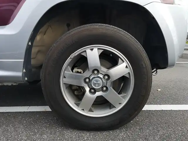 三菱 パジェロ ミニ エクシード 茨城県 2010(平22)年 5万km クールシルバーM/ラズベリーレッドP 純正チューナー/【ラジオ・CD・USB・AUX】/ルーフレール/ETC/４WD/ハロゲンライト/Fフォグ/ヘッドライトレベライザー/電格ミラー/純正フロアマット/純正アルミホイール/ドアバイザー/背面タイヤ