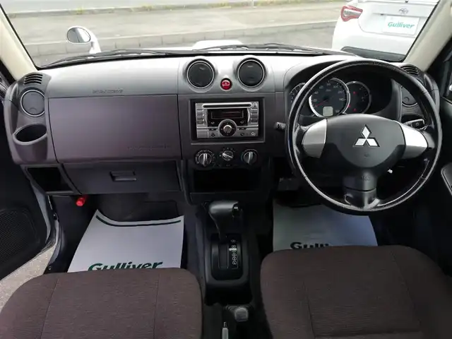 三菱 パジェロ ミニ エクシード 茨城県 2010(平22)年 5万km クールシルバーM/ラズベリーレッドP 純正チューナー/【ラジオ・CD・USB・AUX】/ルーフレール/ETC/４WD/ハロゲンライト/Fフォグ/ヘッドライトレベライザー/電格ミラー/純正フロアマット/純正アルミホイール/ドアバイザー/背面タイヤ